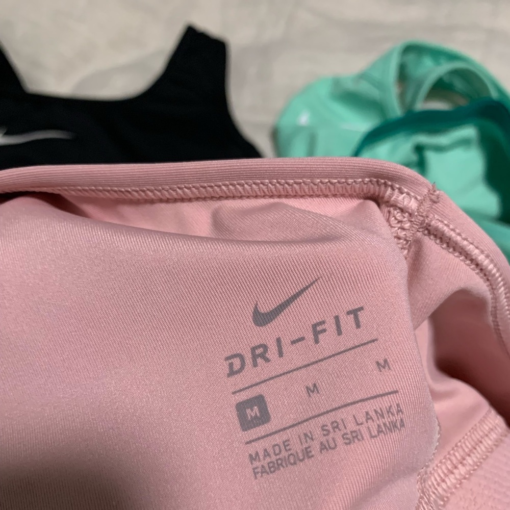 4 pack Nike sports bras; size M